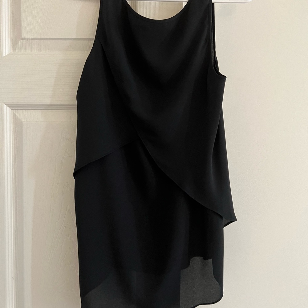Sleeveless black blouse